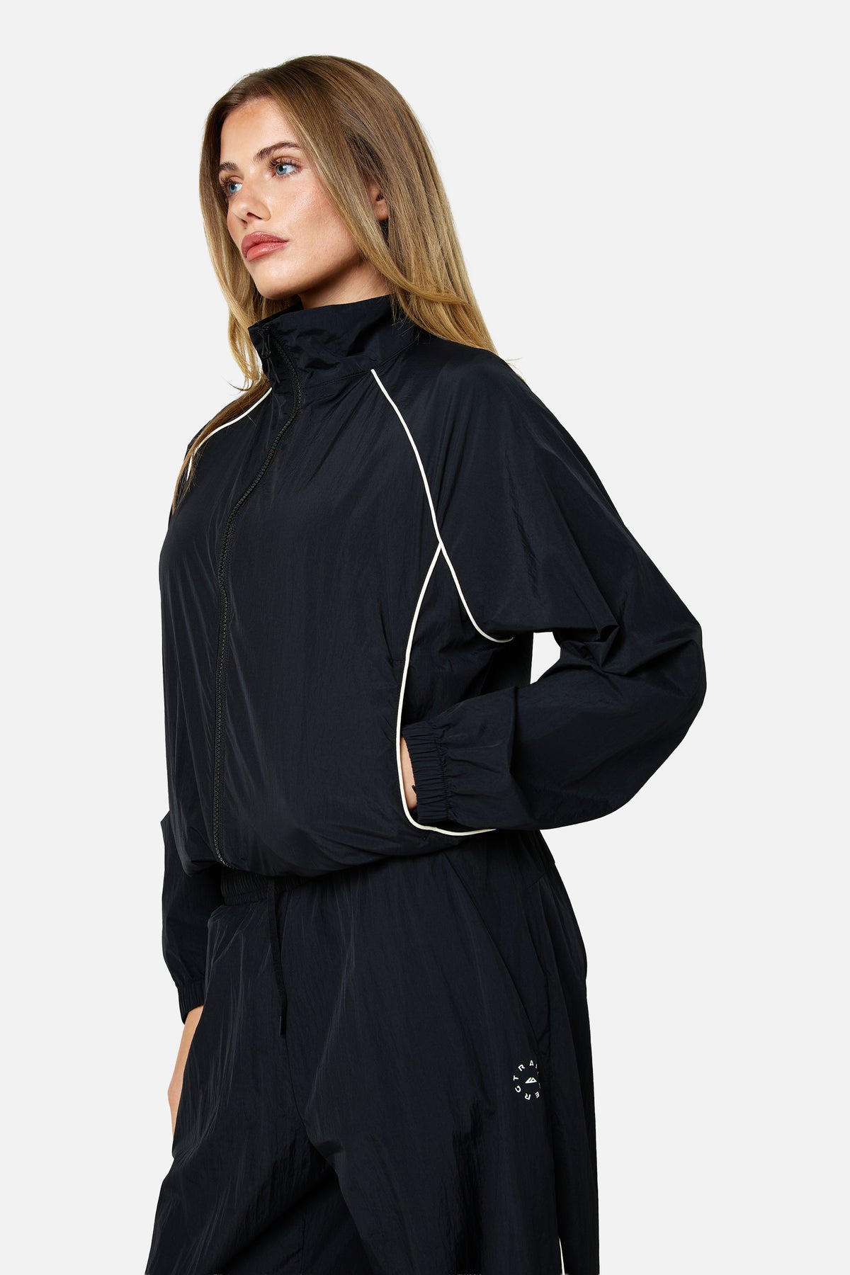 Womens Ignite 2.0 Track Jacket - Black/Candlelight White
